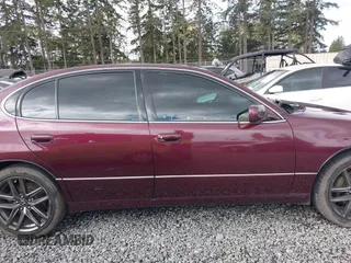 2001 Lexus GS 300 z VIN JT8BD69S410132392, wystawiony jako IAAI lot #42019766 z przebiegiem 119 345 mil mil oraz . Historia ofert i sprzedaży dostępna na DreamBid. Obrazek 13.