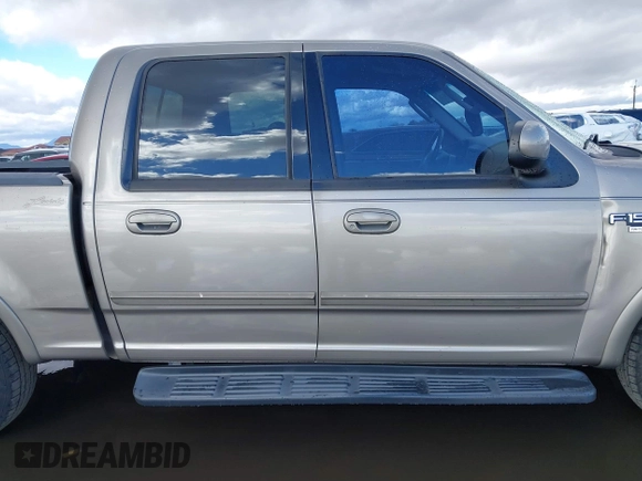 2003 Ford F-150 XLT with VIN 1FTRW07L53KD82167, listed as a IAAI auction lot 41745801 with 216,783 mi miles. Bid and sale history available at carsss.com. Image 13.