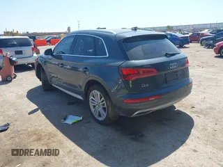 2018 Audi Q5 Premium Plus z VIN WA1BNAFY8J2105219, wystawiony jako IAAI lot #41991915 z przebiegiem 80 732 mil mil oraz . Historia ofert i sprzedaży dostępna na DreamBid. Obrazek 3.