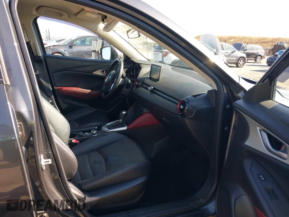 2017 Mazda CX-3 Touring z VIN JM1DKFC72H0142319, wystawiony jako IAAI lot #42223888 z przebiegiem 128 592 mil mil oraz . Historia ofert i sprzedaży dostępna na DreamBid. Obrazek 5.
