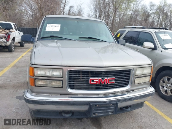1998 GMC Suburban z VIN 3GKFK16R1WG510379, wystawiony jako IAAI lot #41859604 z przebiegiem 300 493 mil mil oraz . Historia ofert i sprzedaży dostępna na DreamBid. Obrazek 6.