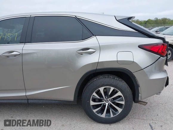 2022 Lexus RX 350 with VIN 2T2AZMDA7NC352957, listed as a IAAI auction lot 42297457 with 34,576 mi miles and . Bid and sale history available at DreamBid. Image 20.