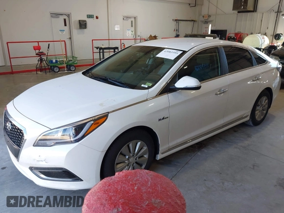 2016 Hyundai Sonata Hybrid SE with VIN KMHE24L15GA009241, listed as a IAAI auction lot 42083395 with 127,068 mi miles. Bid and sale history available at carsss.com. Image 2.