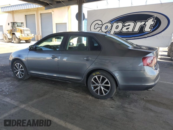 2010 Volkswagen Jetta S with VIN 3VWJZ7AJ9AM052569, listed as a Copart auction lot 59016965 with 166,950 mi miles and Salvage title. Bid and sale history available at DreamBid. Image 2.