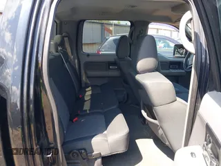2007 Ford F-150 XLT with VIN 1FTPW14V67KC70678, listed as a IAAI auction lot 42002237 with 309,291 mi miles. Bid and sale history available at carsss.com. Image 8.