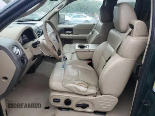 2007 Ford F-150 XLT with VIN 1FTPX14597FA50022, listed as a Copart auction lot 56329335 with 139,500 mi miles and Salvage title. Bid and sale history available at DreamBid. Image 7.