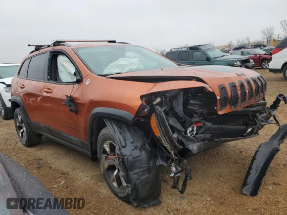 2015 Jeep Cherokee Trailhawk z VIN 1C4PJMBS7FW704980, wystawiony jako Copart lot #70334472 z przebiegiem 127 562 mil mil oraz Szkoda całkowita • Salvage title. Historia ofert i sprzedaży dostępna na DreamBid. Obrazek 4.