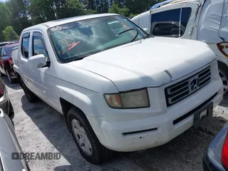 2006 Honda Ridgeline RTL z VIN 2HJYK16506H512654, wystawiony jako IAAI lot #42245264 z przebiegiem 303 551 mil mil oraz . Historia ofert i sprzedaży dostępna na DreamBid. Obrazek 1.