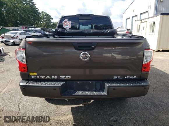 2017 Nissan Titan XD SL with VIN 1N6BA1F44HN510174, listed as a Copart auction lot 63245694 with 121,868 mi miles and Salvage Title. Bid and sale history available at carsss.com. Image 6.