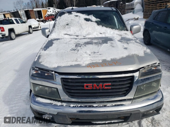 2011 GMC Canyon SLT with VIN 1GTH6NFE2B8117617, listed as a Copart auction lot 43222695 with 146,277 mi miles and Salvage Title. Bid and sale history available at carsss.com. Image 5.