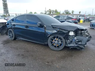 2023 Honda Civic Sport with VIN 19XFL2H8XPE020359, listed as a IAAI auction lot 41818720 with Not Provided miles and . Bid and sale history available at DreamBid. Image 14.