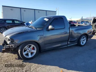 2003 Ford F-150 Lightning with VIN 2FTRF07313CA43362, listed as a Copart auction lot 87544765 with 98,589 mi miles and Salvage Title. Bid and sale history available at carsss.com. Image 1.