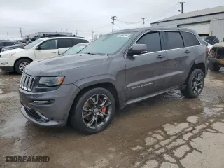 2015 Jeep Grand Cherokee SRT with VIN 1C4RJFDJ8FC752210, listed as a Copart auction lot 45694094 with 76,721 mi miles and Salvage Title. Bid and sale history available at carsss.com. Image 1.