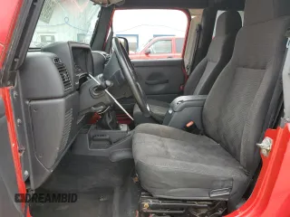 2005 Jeep Wrangler Sport z VIN 1J4FA49S75P317995, wystawiony jako Copart lot #58060055 z przebiegiem 189 332 mil mil oraz Szkoda całkowita • Salvage title. Historia ofert i sprzedaży dostępna na DreamBid. Obrazek 7.