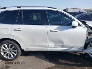 2016 Volvo XC90 Momentum with VIN YV4102XK4G1059299, listed as a IAAI auction lot 41749794 with 76,439 mi miles and . Bid and sale history available at DreamBid. Image 14.