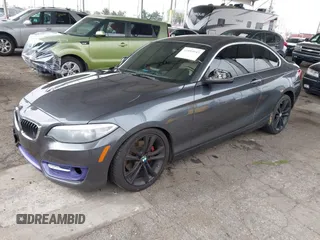 2014 BMW 2 Series 228i with VIN WBA1F5C5XEV255284, listed as a IAAI auction lot 41895642 with 62,079 mi miles and . Bid and sale history available at carsss.com. Image 18.