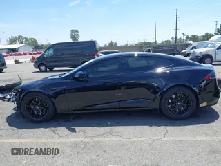 2022 Tesla Model S with VIN 5YJSA1E51NF464231, listed as a IAAI auction lot 42077838 with 53,290 mi miles and . Bid and sale history available at DreamBid. Image 15.