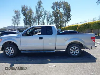 2014 Ford F-150 XL with VIN 1FTEX1CM2EFB01776, listed as a IAAI auction lot 41806274 with 157,704 mi miles. Bid and sale history available at carsss.com. Image 15.