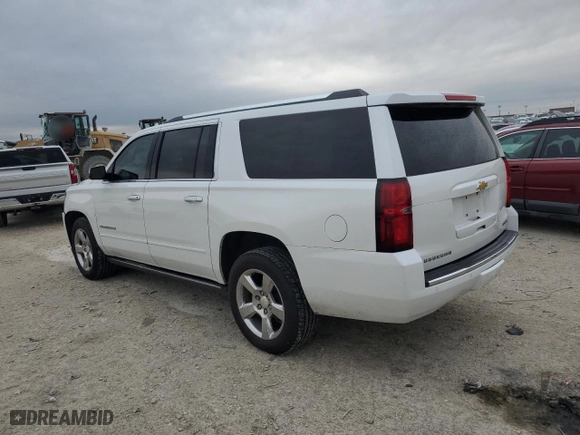 2017 Chevrolet Suburban Premier with VIN 1GNSCJKC3HR380897, listed as a Copart auction lot 79512474 with 121,928 mi miles and Salvage Title. Bid and sale history available at carsss.com. Image 2.