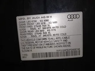 2015 Audi Q7 Premium Plus with VIN WA1LGAFE2FD005746, listed as a IAAI auction lot 42143924 with 143,835 mi miles and . Bid and sale history available at DreamBid. Image 9.