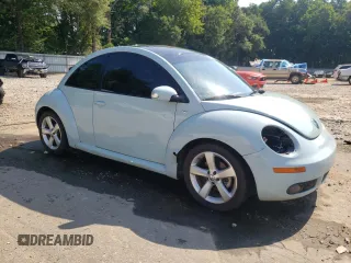 2010 Volkswagen Beetle with VIN 3VWRG3AG0AM027565, listed as a Copart auction lot 61908315 with 74,858 mi miles and Salvage title. Bid and sale history available at DreamBid. Image 4.