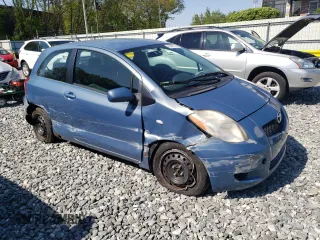 2007 Toyota Yaris with VIN JTDJT923275134917, listed as a Copart auction lot 56901845 with 100,574 mi miles and Clean Title. Bid and sale history available at DreamBid. Image 4.