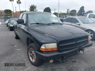 1998 Dodge Dakota SLT with VIN 1B7GL22Y6WS634348, listed as a IAAI auction lot 41472873 with 196,894 mi miles. Bid and sale history available at carsss.com. Image 1.