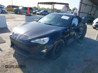 2014 Scion FR-S z VIN JF1ZNAA11E8702526, wystawiony jako IAAI lot #42068499 z przebiegiem 79 312 mil mil oraz . Historia ofert i sprzedaży dostępna na DreamBid. Obrazek 16.