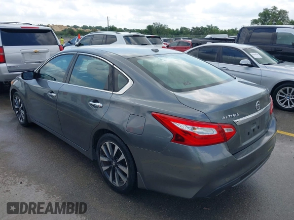 2016 Nissan Altima SV with VIN 1N4AL3AP8GC165916, listed as a IAAI auction lot 42035695 with 126,398 mi miles and . Bid and sale history available at DreamBid. Image 3.