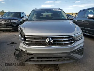 2023 Volkswagen Tiguan S with VIN 3VVFB7AX0PM086699, listed as a Copart auction lot 62885184 with 5,694 mi miles and Salvage title. Bid and sale history available at DreamBid. Image 5.