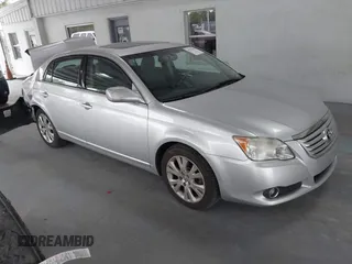 2009 Toyota Avalon XL with VIN 4T1BK36B69U341854, listed as a IAAI auction lot 41727553 with 102,369 mi miles. Bid and sale history available at carsss.com. Image 1.