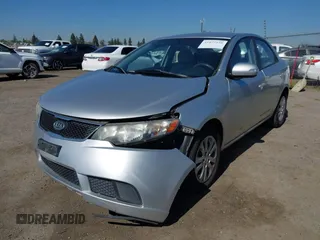 2010 Kia Forte EX with VIN KNAFU4A2XA5097831, listed as a IAAI auction lot 41872156 with 168,081 mi miles. Bid and sale history available at carsss.com. Image 19.