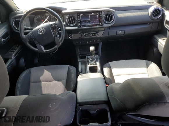 2020 Toyota Tacoma SR5 with VIN 3TMAZ5CN2LM137991, listed as a Copart auction lot 60317895 with 98,054 mi miles and Salvage title. Bid and sale history available at DreamBid. Image 8.