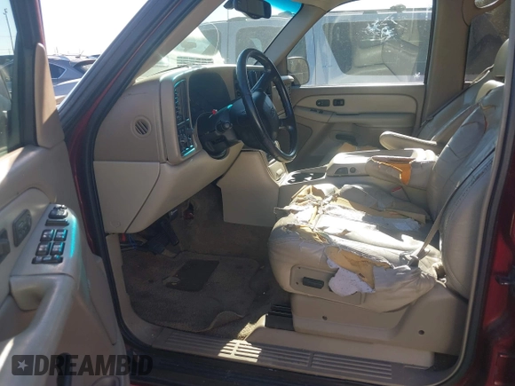 2002 Chevrolet Suburban LT with VIN 1GNEC16Z02J229078, listed as a IAAI auction lot 41737482 with 306,502 mi miles and . Bid and sale history available at DreamBid. Image 5.