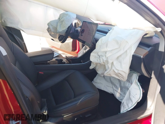 2018 Tesla Model 3 Long Range Battery z VIN 5YJ3E1EA4JF022284, wystawiony jako IAAI lot #41422203 z przebiegiem 71 521 mil mil oraz . Historia ofert i sprzedaży dostępna na DreamBid. Obrazek 5.