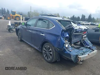 2019 Nissan Sentra S z VIN 3N1AB7AP3KY358451, wystawiony jako IAAI lot #41960388 z przebiegiem 129 478 mil mil oraz . Historia ofert i sprzedaży dostępna na DreamBid. Obrazek 3.