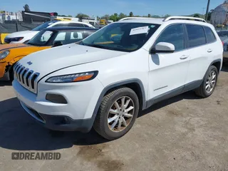 2016 Jeep Cherokee Limited with VIN 1C4PJLDB3GW221804, listed as a IAAI auction lot 41975767 with 126,883 mi miles. Bid and sale history available at carsss.com. Image 2.