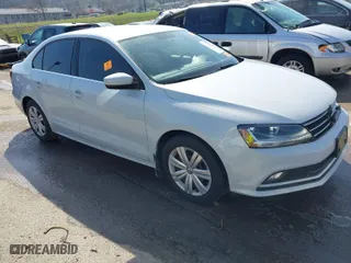 2017 Volkswagen Jetta 1.4T S with VIN 3VW167AJ2HM287690, listed as a IAAI auction lot 41837464 with 116,604 mi miles. Bid and sale history available at carsss.com. Image 1.