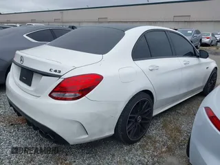2018 Mercedes-Benz C 43 AMG with VIN 55SWF6EB5JU235937, listed as a IAAI auction lot 42050650 with 67,876 mi miles and . Bid and sale history available at carsss.com. Image 4.