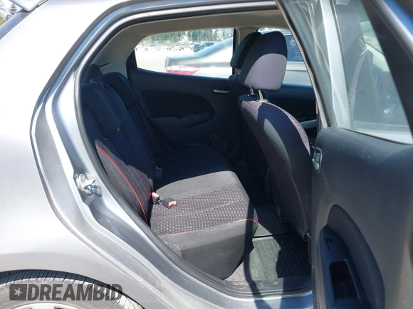 2013 Mazda 2 Touring z VIN JM1DE1LY5D0160410, wystawiony jako IAAI lot #42034986 z przebiegiem 124 791 mil mil oraz . Historia ofert i sprzedaży dostępna na DreamBid. Obrazek 8.