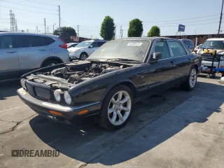 2003 Jaguar XJ with VIN SAJDA15B63MF52618, listed as a Copart auction lot 64336415 with Not provided miles and Clean title. Bid and sale history available at DreamBid. Image 1.