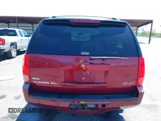 2011 GMC Yukon XL SLT with VIN 1GKS2KE37BR118843, listed as a IAAI auction lot 41983870 with 236,029 mi miles. Bid and sale history available at carsss.com. Image 16.