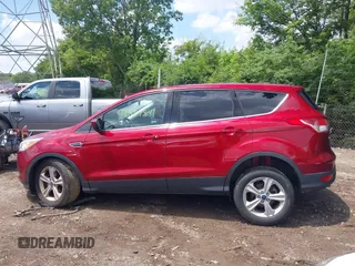 2013 Ford Escape SE with VIN 1FMCU0GX6DUA98305, listed as a IAAI auction lot 42389841 with 109,484 mi miles and . Bid and sale history available at DreamBid. Image 14.