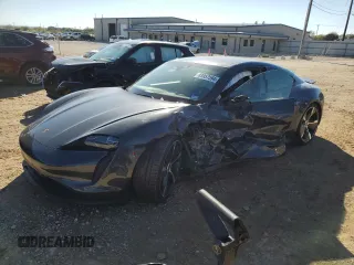2021 Porsche Taycan 4S z VIN WP0AB2Y18MSA42310, wystawiony jako Copart lot #83957594 z przebiegiem Nie podano mil oraz Szkoda całkowita • Salvage title. Historia ofert i sprzedaży dostępna na DreamBid. Obrazek 1.