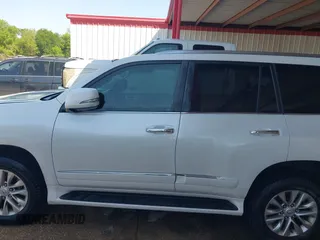 2015 Lexus GX 460 with VIN JTJBM7FX7F5116959, listed as a IAAI auction lot 41868186 with 249,402 mi miles and . Bid and sale history available at carsss.com. Image 14.