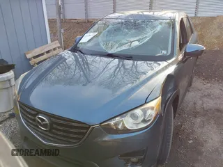 2016 Mazda CX-5 Touring with VIN JM3KE4CY5G0771252, listed as a IAAI auction lot 42138637 with 106,767 mi miles and . Bid and sale history available at carsss.com. Image 12.