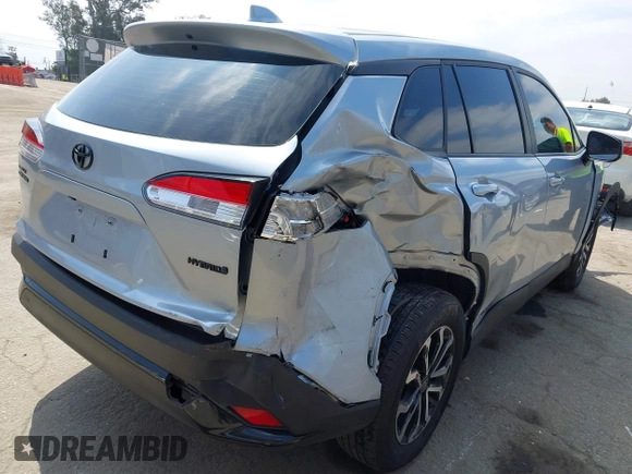 2023 Toyota Corolla Cross Hybrid S with VIN 7MUFBABG1PV014992, listed as a IAAI auction lot 42202656 with 18,913 mi miles and . Bid and sale history available at DreamBid. Image 6.
