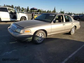 2005 Ford Crown Victoria LX with VIN 2FAFP74W75X129929, listed as a Copart auction lot 89020125 with 156,115 mi miles and Salvage Title. Bid and sale history available at carsss.com. Image 1.