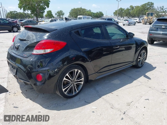 2016 Hyundai Veloster Turbo z VIN KMHTC6AEXGU281207, wystawiony jako IAAI lot #42197497 z przebiegiem 107 431 mil mil oraz . Historia ofert i sprzedaży dostępna na DreamBid. Obrazek 4.