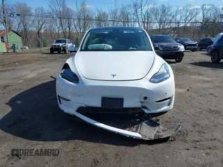 2021 Tesla Model Y Long Range with VIN 5YJYGDEE9MF239726, listed as a IAAI auction lot 41952158 with 37,088 mi miles and . Bid and sale history available at DreamBid. Image 6.
